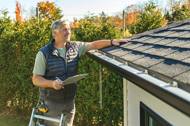 Professional Roof Repair technician working in Whately, MA